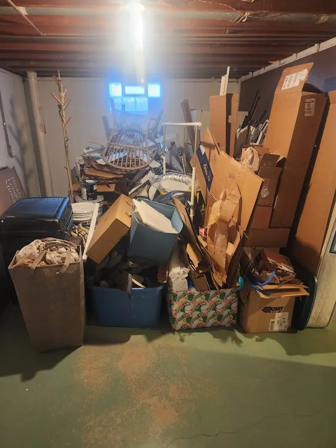 Roll-off dumpster container at job site for Concrete Dumpster Rental in Red Bank